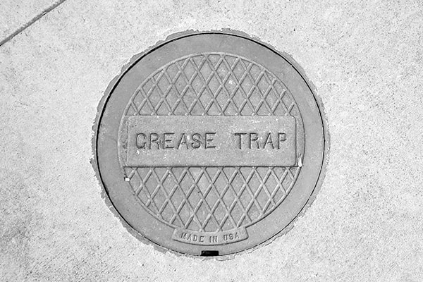 neglecting grease trap pumping can lead to clogged drains, foul odors, and even health department violations